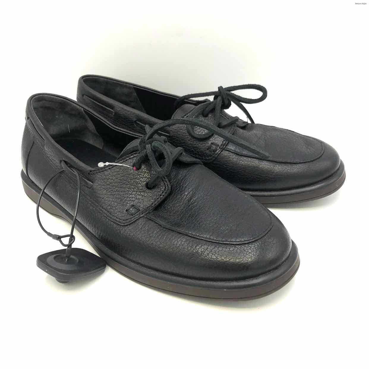 Vince shops leather shoes