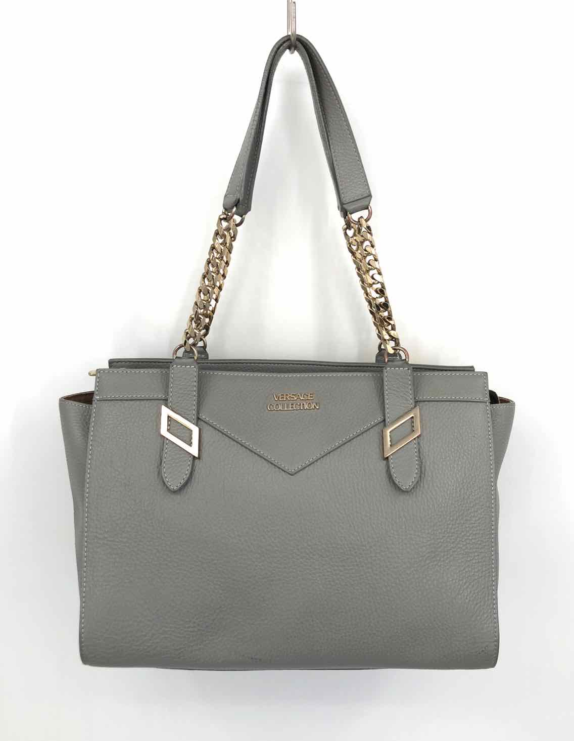 Handbags | STYLISH GREY COLOR LEATHER HAND PURSE FOR WOMEN. LITTLE STICH  ISSUE ON ONE SIDE BUT OVERALL LOOKS GREAT | Freeup